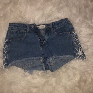 denim pacsun shorts with lace up sides